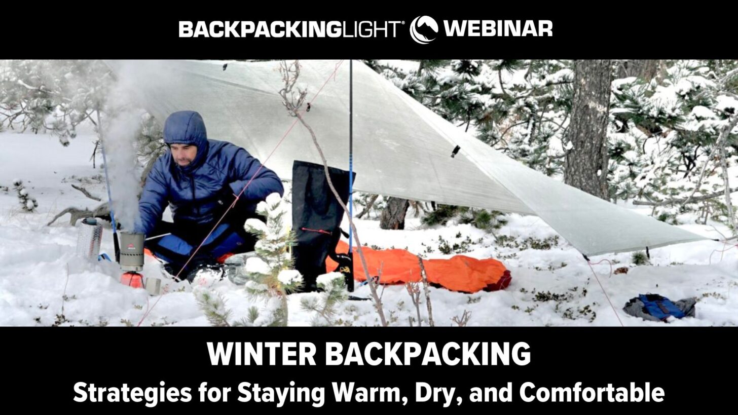 webinar winter backpacking man under tarp