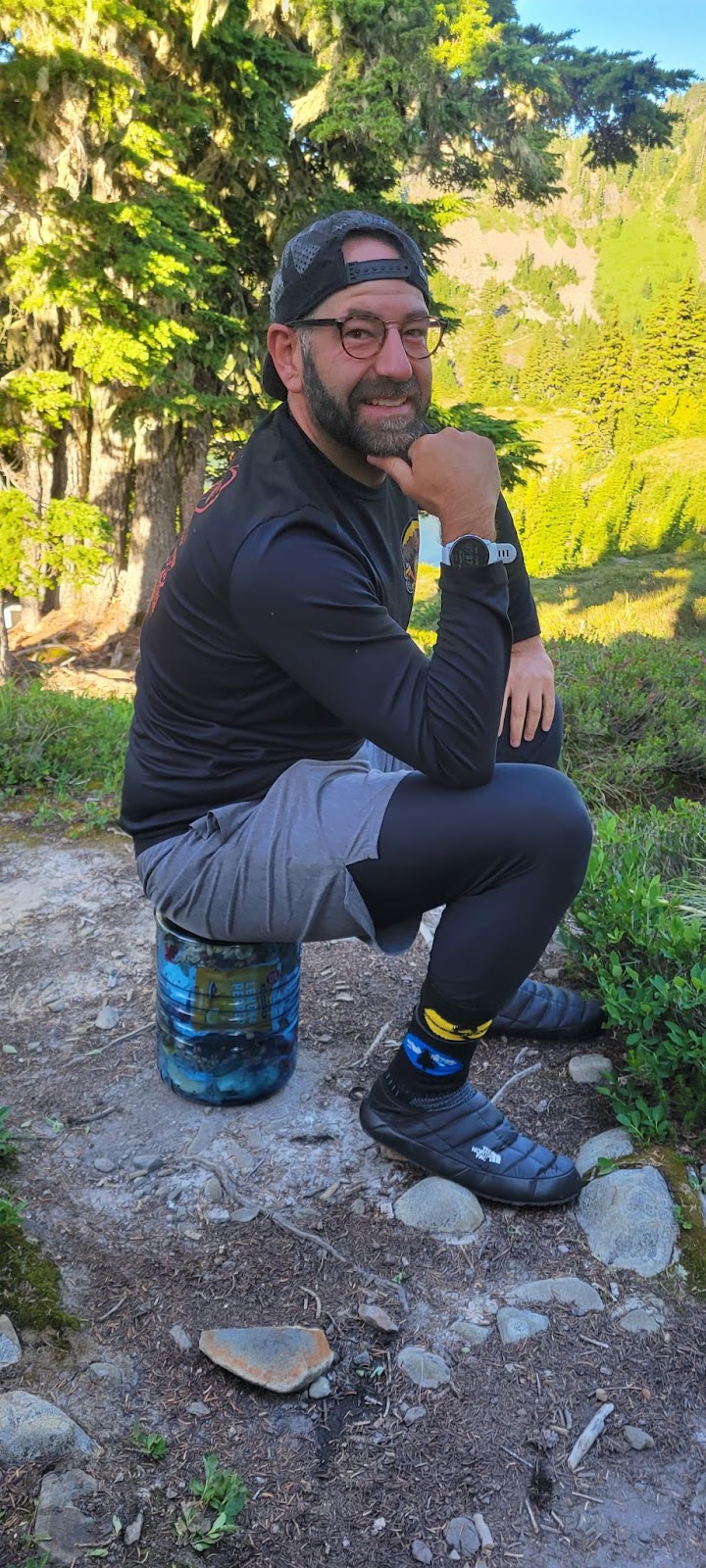 The bear vault being used as a chair.