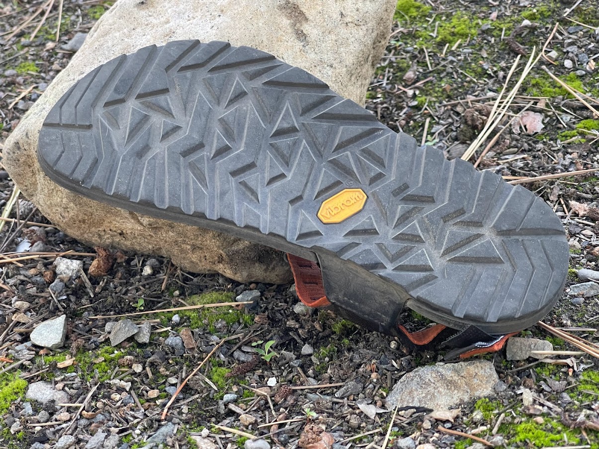 A close-up of the tread pattern of the sandals.