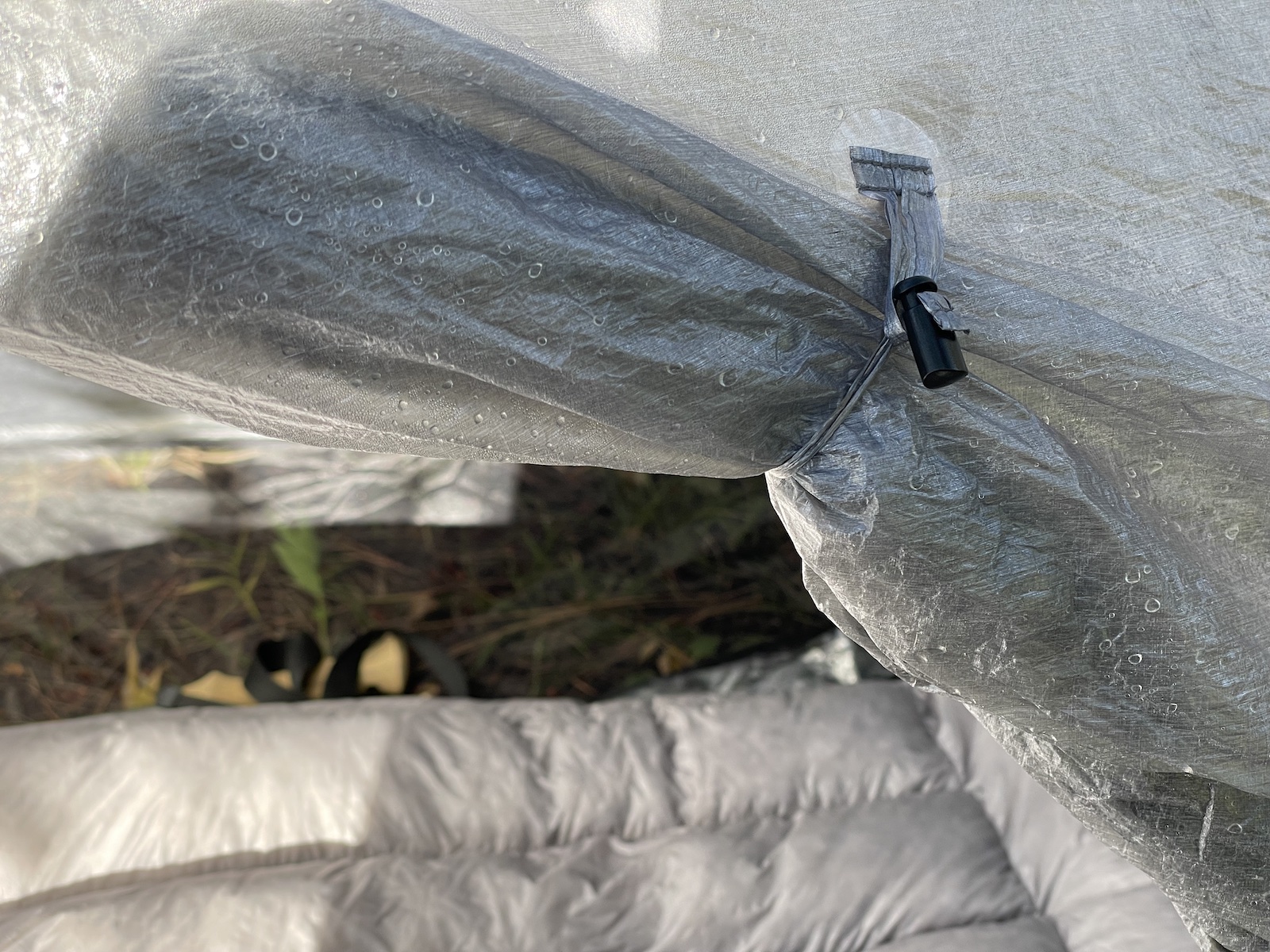 the inside of a tent with a sleeping bag on top of it