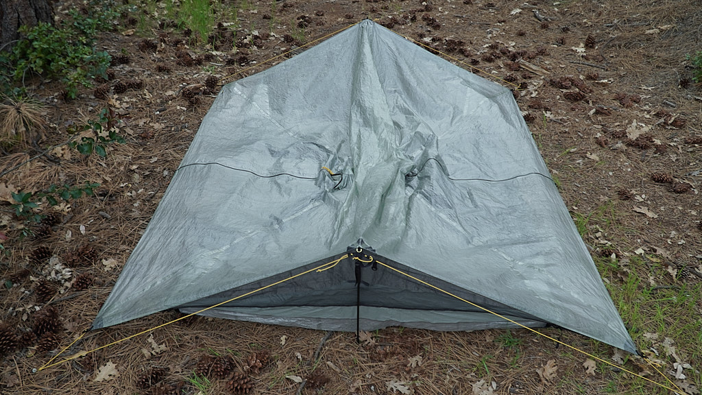 a shot from above looking down at a shelter without poles in it.