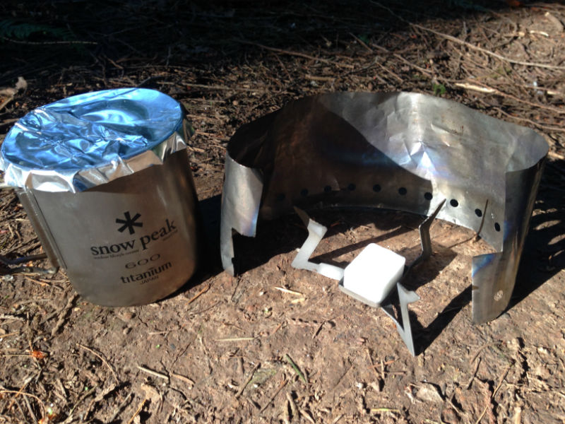 a chemical stove, pot, and windscreen