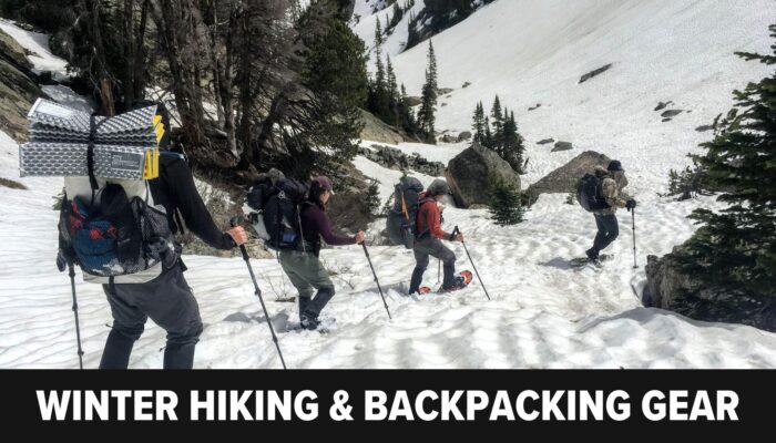 hikers on a snow slope